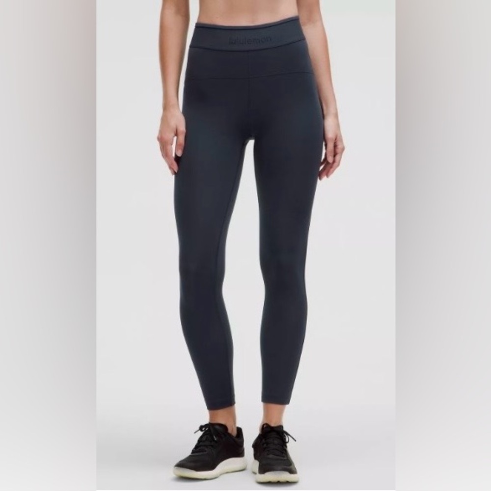 Lululemon License to Train HR
Tight 25" *Logo Women Sz 14 TRNV